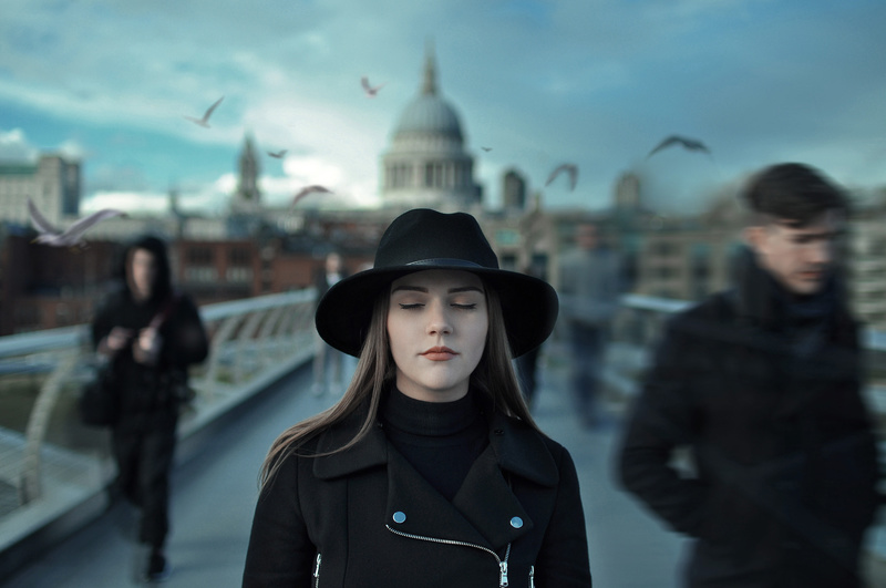 Female model photo shoot of Jade Apple in london millenium bridge