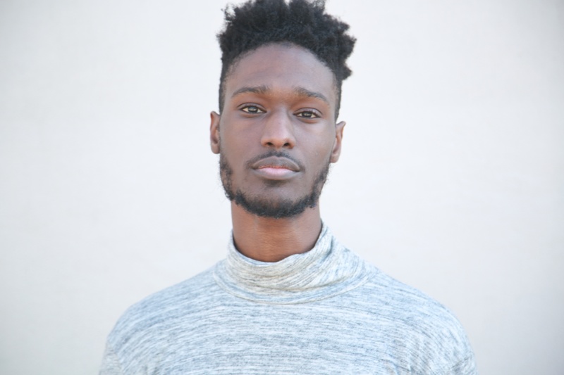 Male model photo shoot of Omarwali Jones