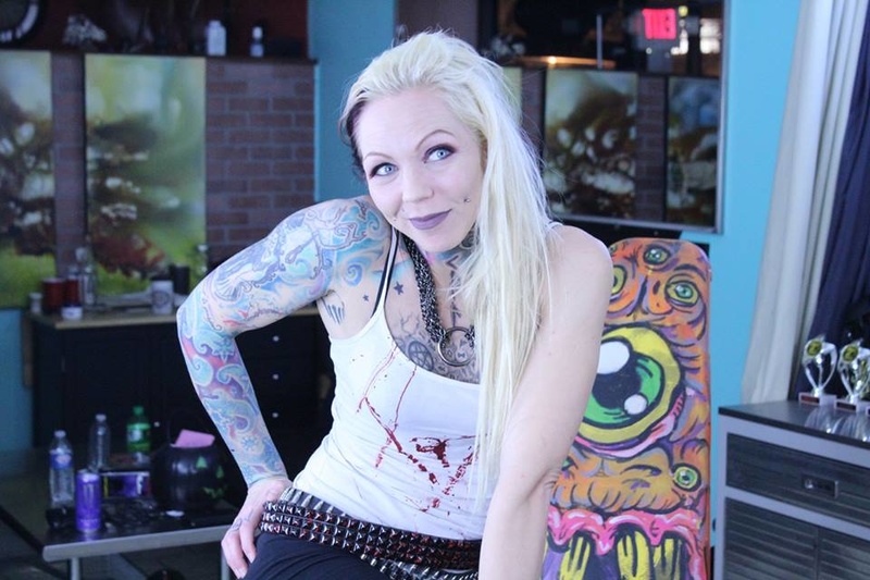 Female model photo shoot of Shannon Razorblade  Pro in Snake and Dagger Tattoo Company