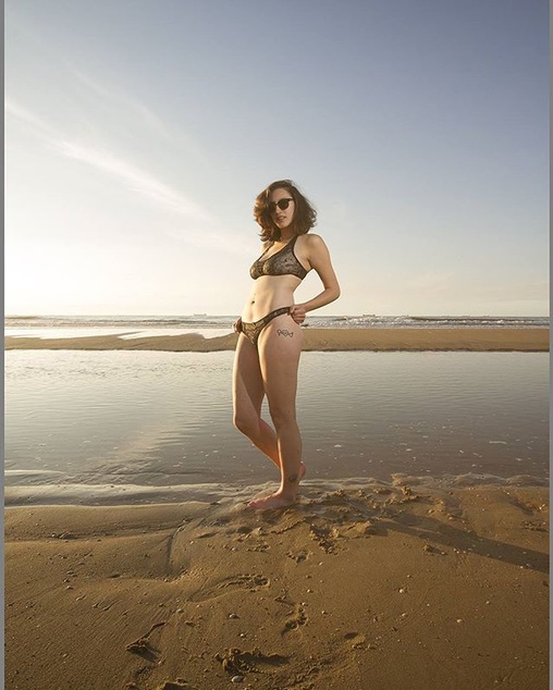 Female model photo shoot of Lara Beard in Scheveningen beach, The Hague, Holland