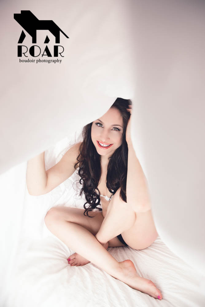 Female model photo shoot of Pederzani in Roar Boudoir Studios