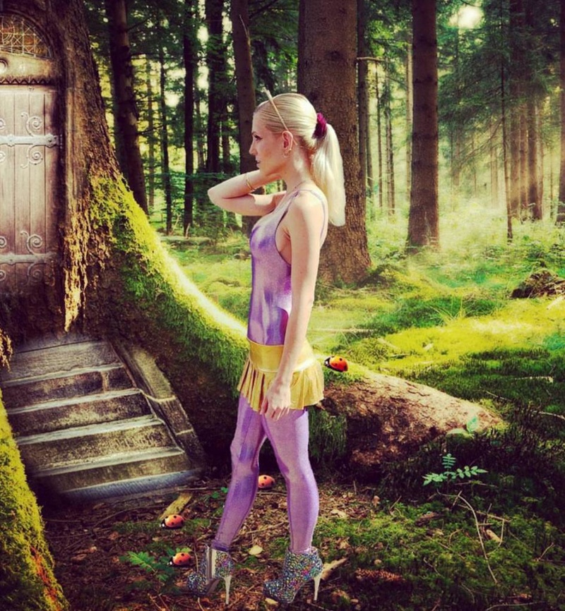 Female model photo shoot of Alice in Wonderland