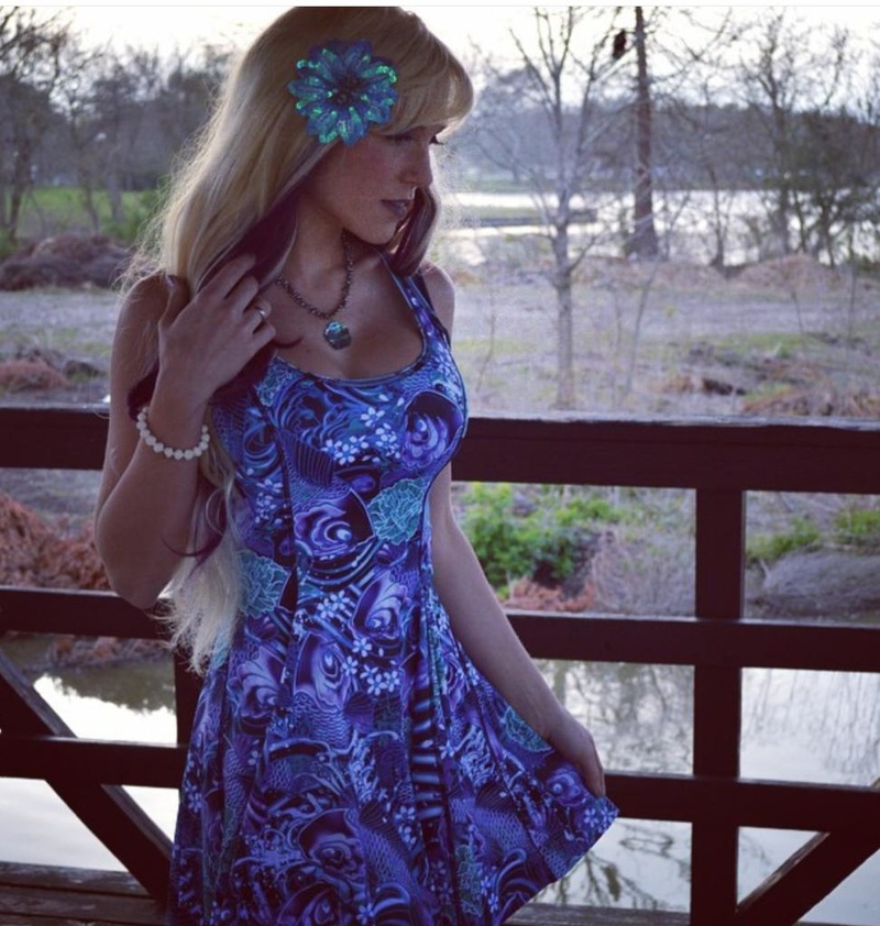 Female model photo shoot of Alice in Wonderland
