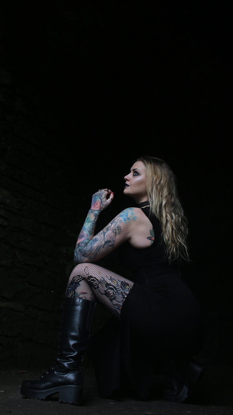 Female model photo shoot of Dark-light Photography in Old Calton Burial, Edinburgh