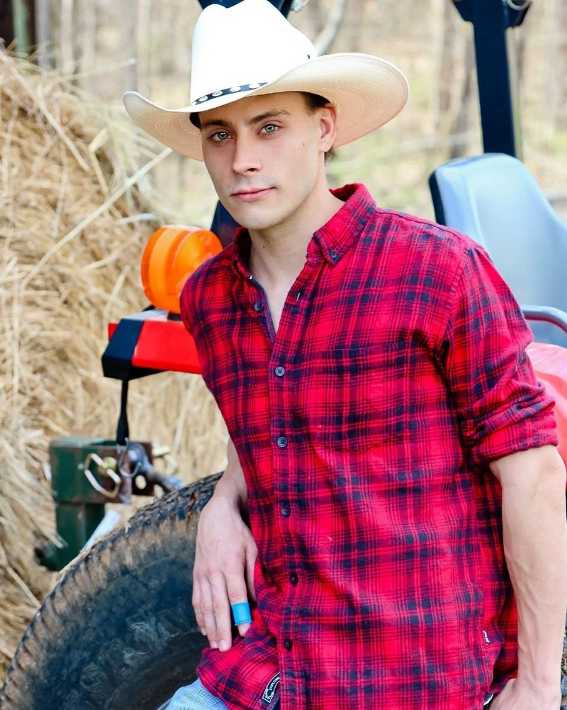Male model photo shoot of Nate1099 in blue meadow farm