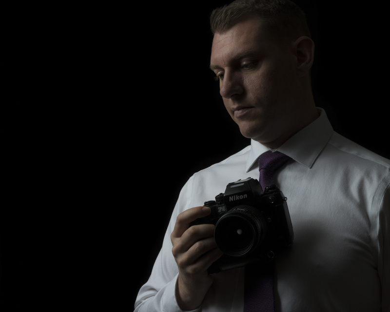 Male model photo shoot of OptiksPhotography
