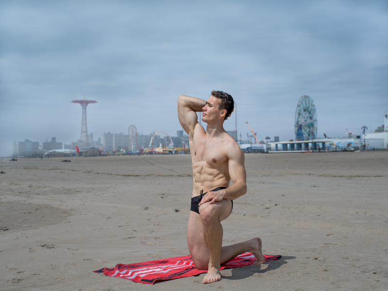 Male model photo shoot of role model Roman by Gruenholtz in Coney Island beach