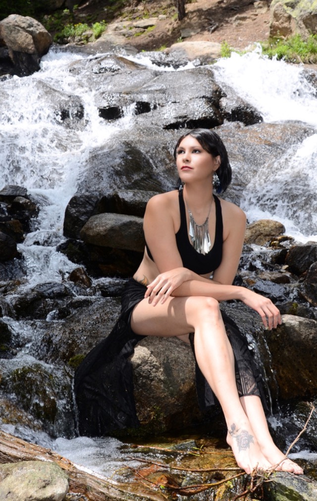 Female model photo shoot of Amo Morbia  in The falls of St. Mary's Glacier