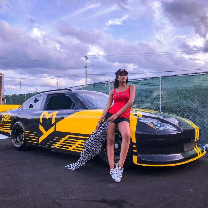 Female model photo shoot of Miilo18 by RACEGIRL MOTORSPORTS in Charlotte Motor Speedway