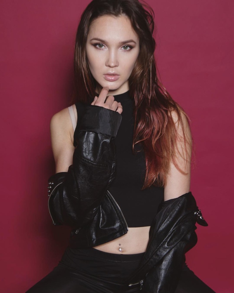 Female model photo shoot of Kamila Plum Boom