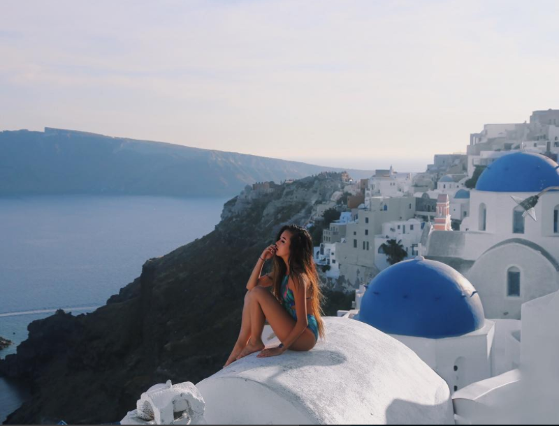 Female model photo shoot of nianhu in Santorini, Greece