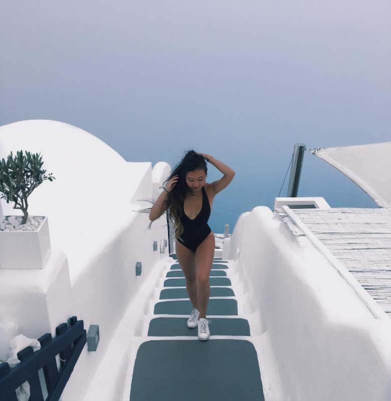 Female model photo shoot of nianhu in Santorini, Greece