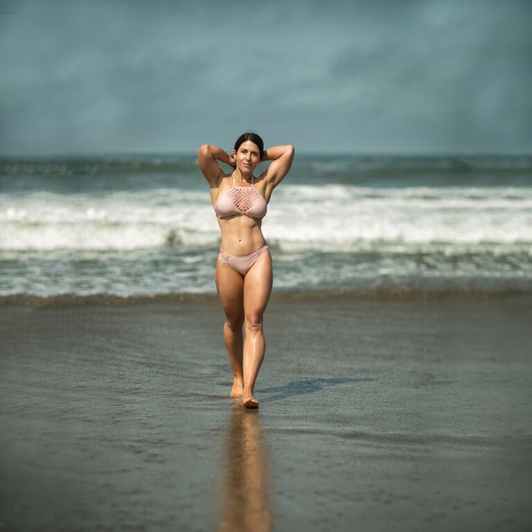 Female model photo shoot of BMR in Ocean Beach, California