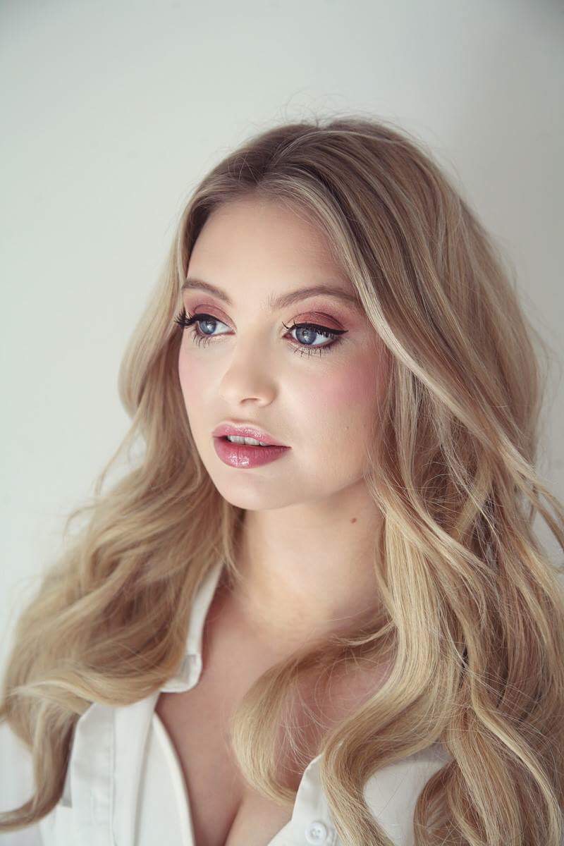 Female model photo shoot of Charlotte Joy makeup
