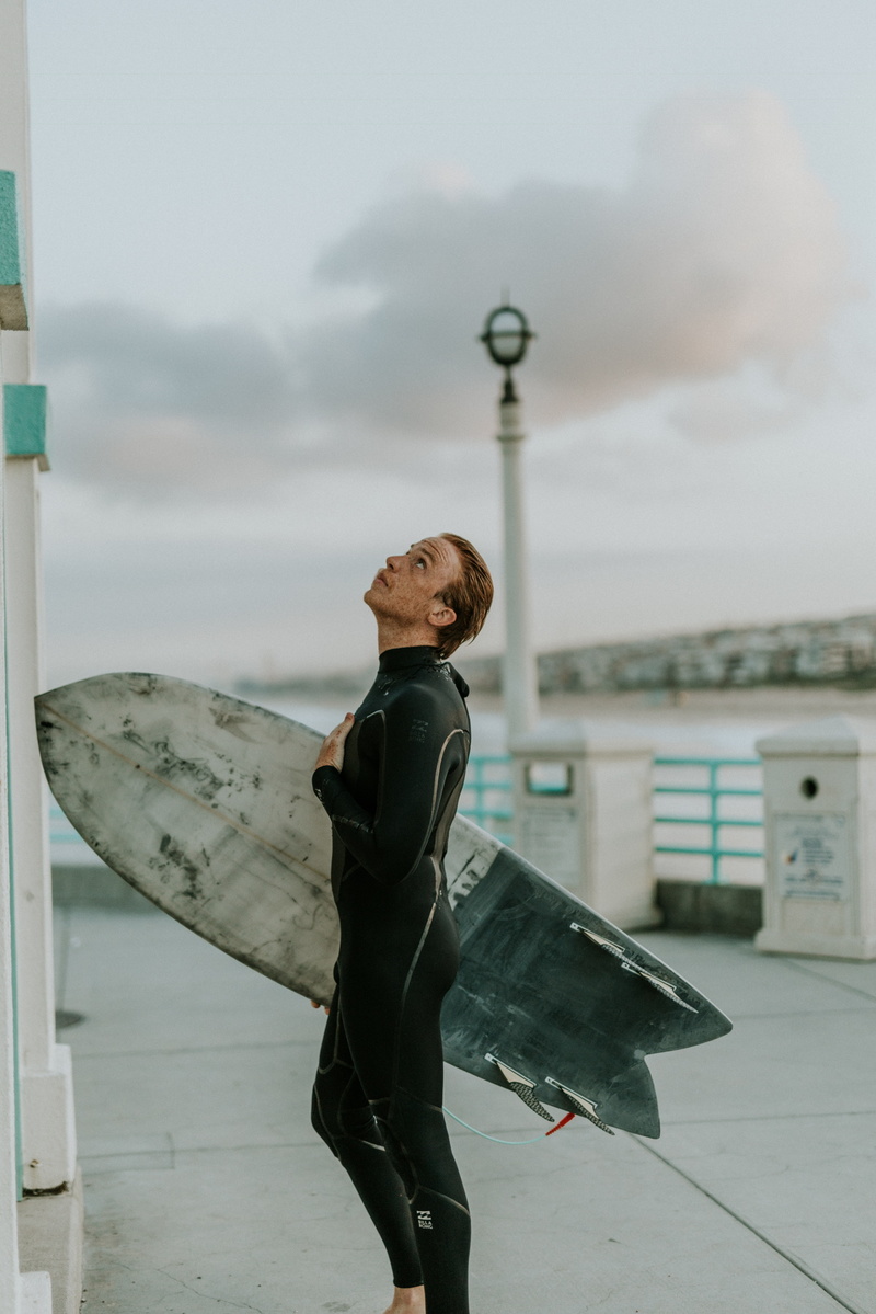 Male model photo shoot of Kendallblake in Manhattan Beach Pier