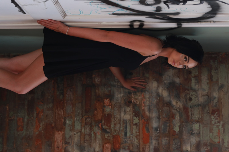 Female model photo shoot of BriChristine in Graffiti wearhouse