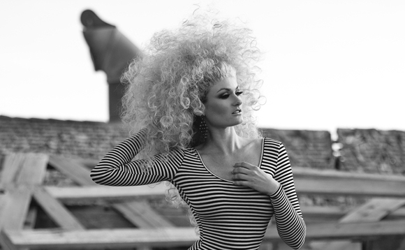 Female model photo shoot of Hair Style Studio