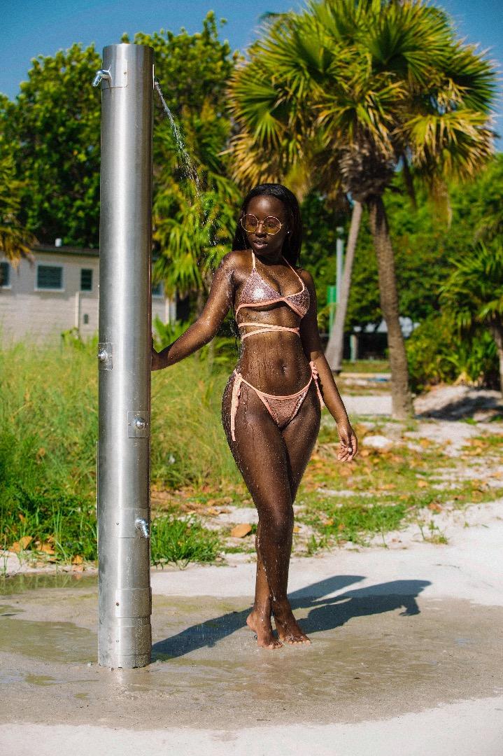 Female model photo shoot of Darkskvnbeauty in Key Biscayne