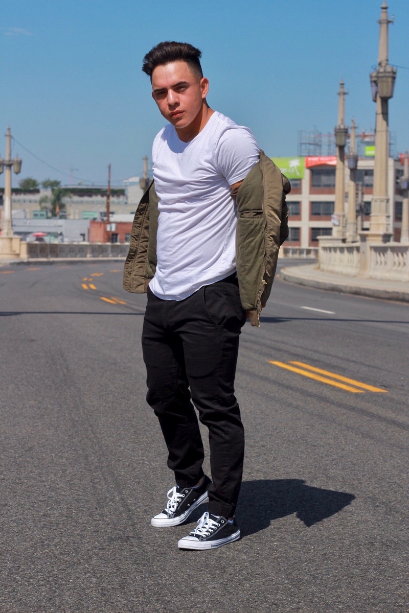 Male model photo shoot of mrmonroy__ in Los Angeles Bridge