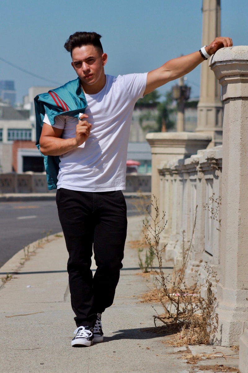 Male model photo shoot of mrmonroy__ in Los Angeles Bridge