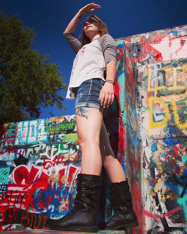 Female model photo shoot of Ember Mordaunt in Graffiti Park Austin, Texas