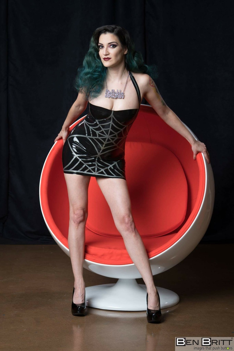 Female model photo shoot of Dollskin Designs Latex