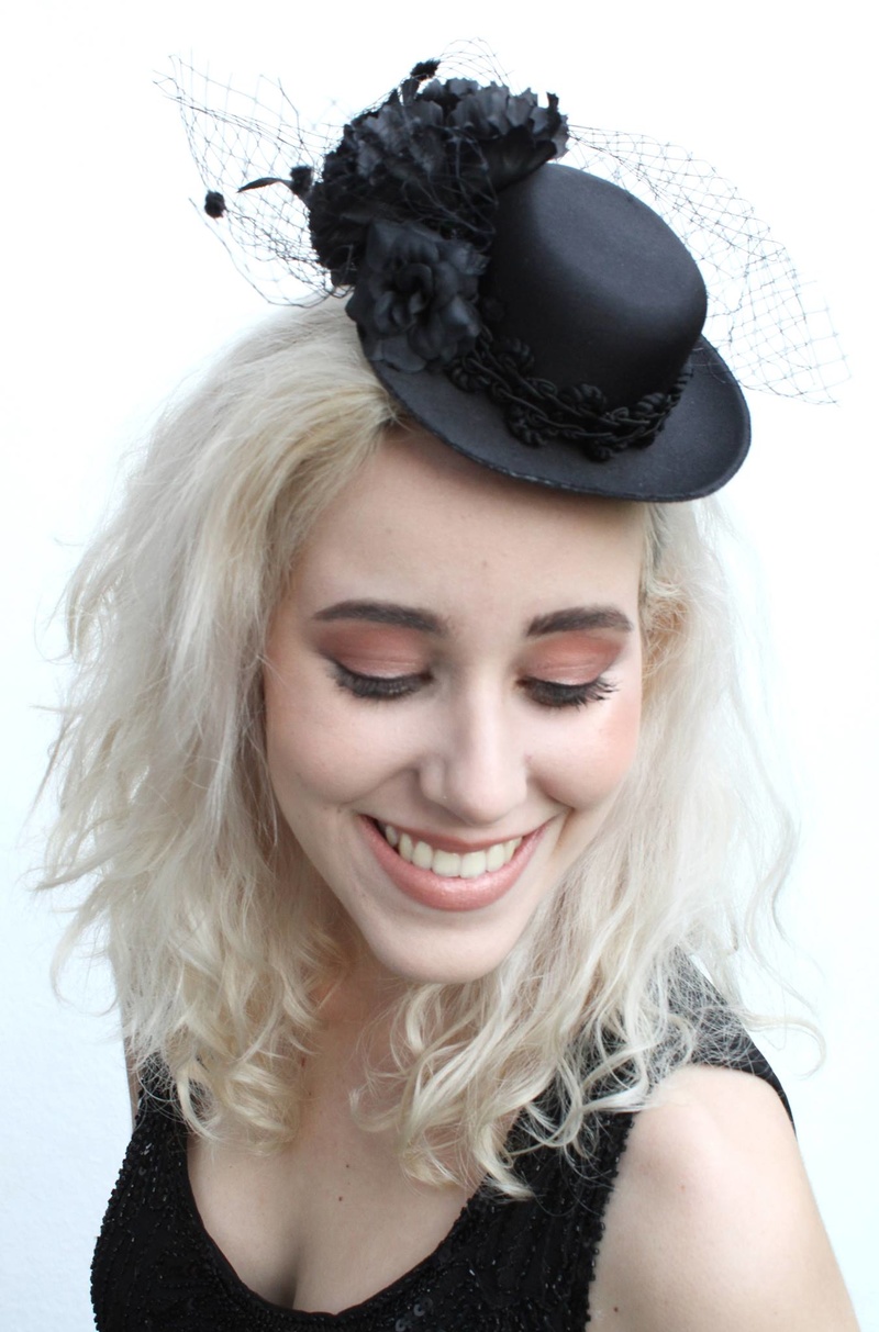 Female model photo shoot of Emma Olliff in Brighton, clothing designed by Kate Dressekie