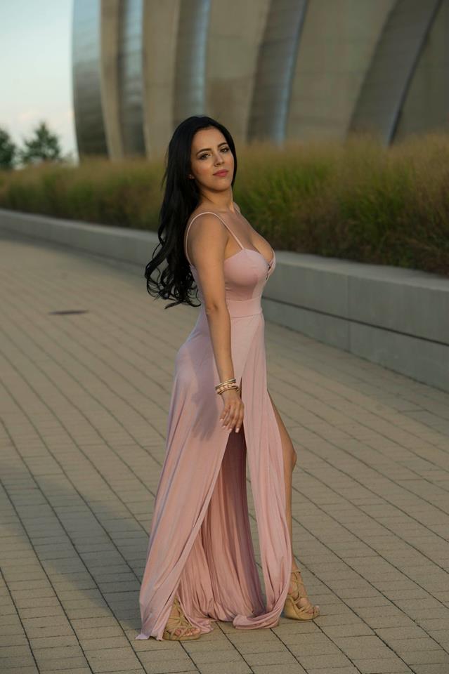 Female model photo shoot of Lizeth Covarrubias in Kauffman Center for the Performing Arts