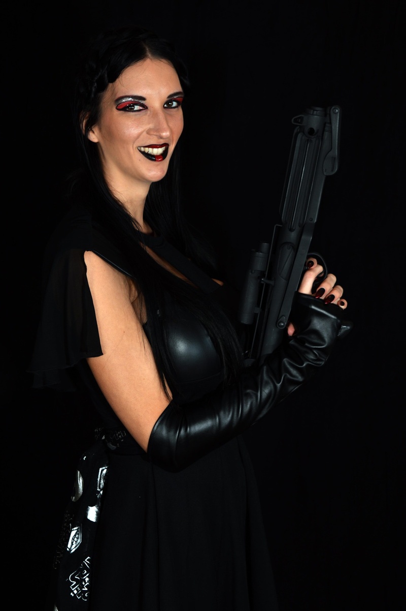 Female model photo shoot of The Darkside Dame