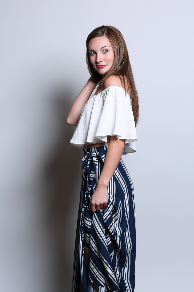 Female model photo shoot of emmyedonahue in Three Sisters Clothing Boutique
