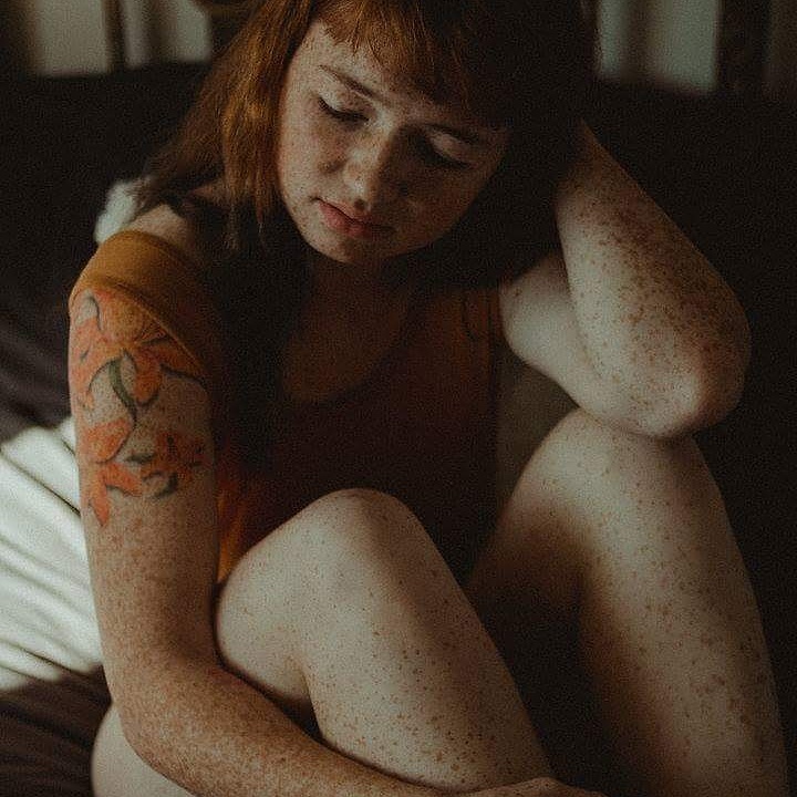 Female model photo shoot of Tattoos and Freckles