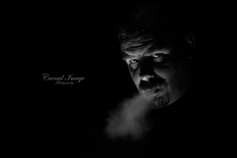 Male model photo shoot of Carnal_Image in Darkness