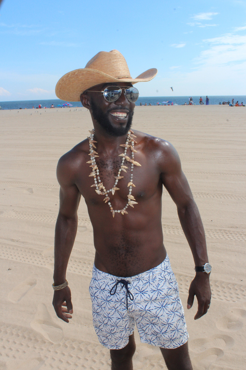 Male model photo shoot of Ogheneovo in Coney Island Beach