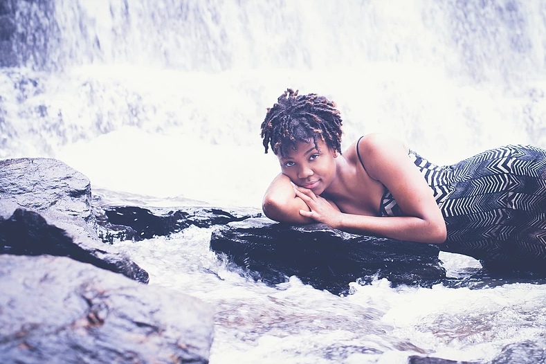Female model photo shoot of Elaya_Walker in Roswell Mill Waterfall