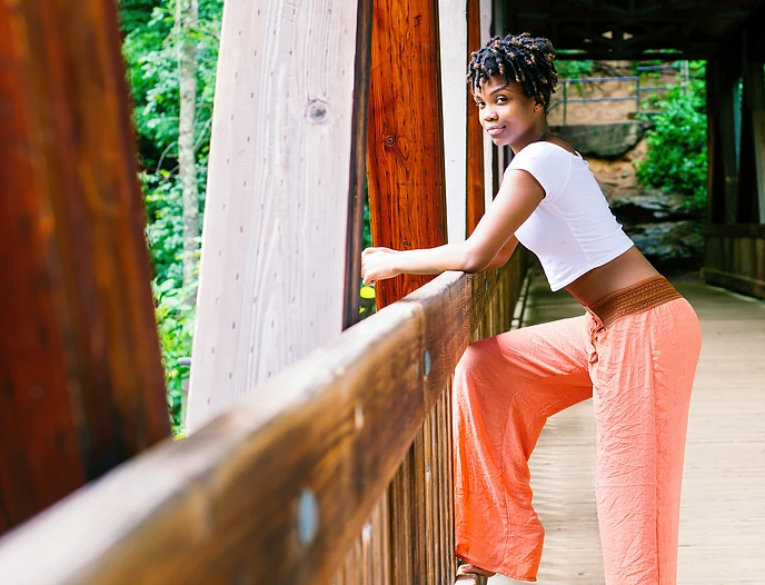 Female model photo shoot of Elaya_Walker in Roswell Mills Waterfall