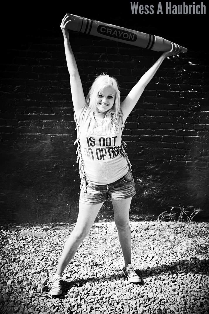 Female model photo shoot of Ember Fox in The District in Quincy, IL