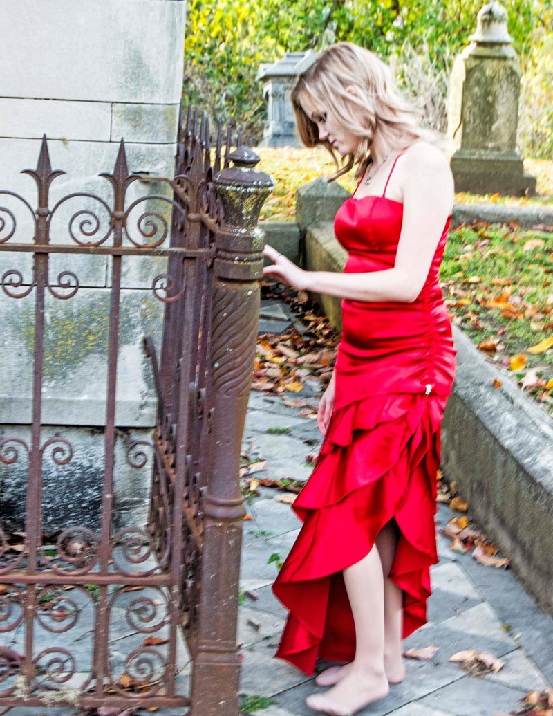 Female model photo shoot of Ember Fox in Woodland Cemetery in Quincy, IL