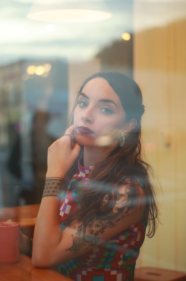 Female model photo shoot of Thelostmoonprincess in Toro's Coffee shop