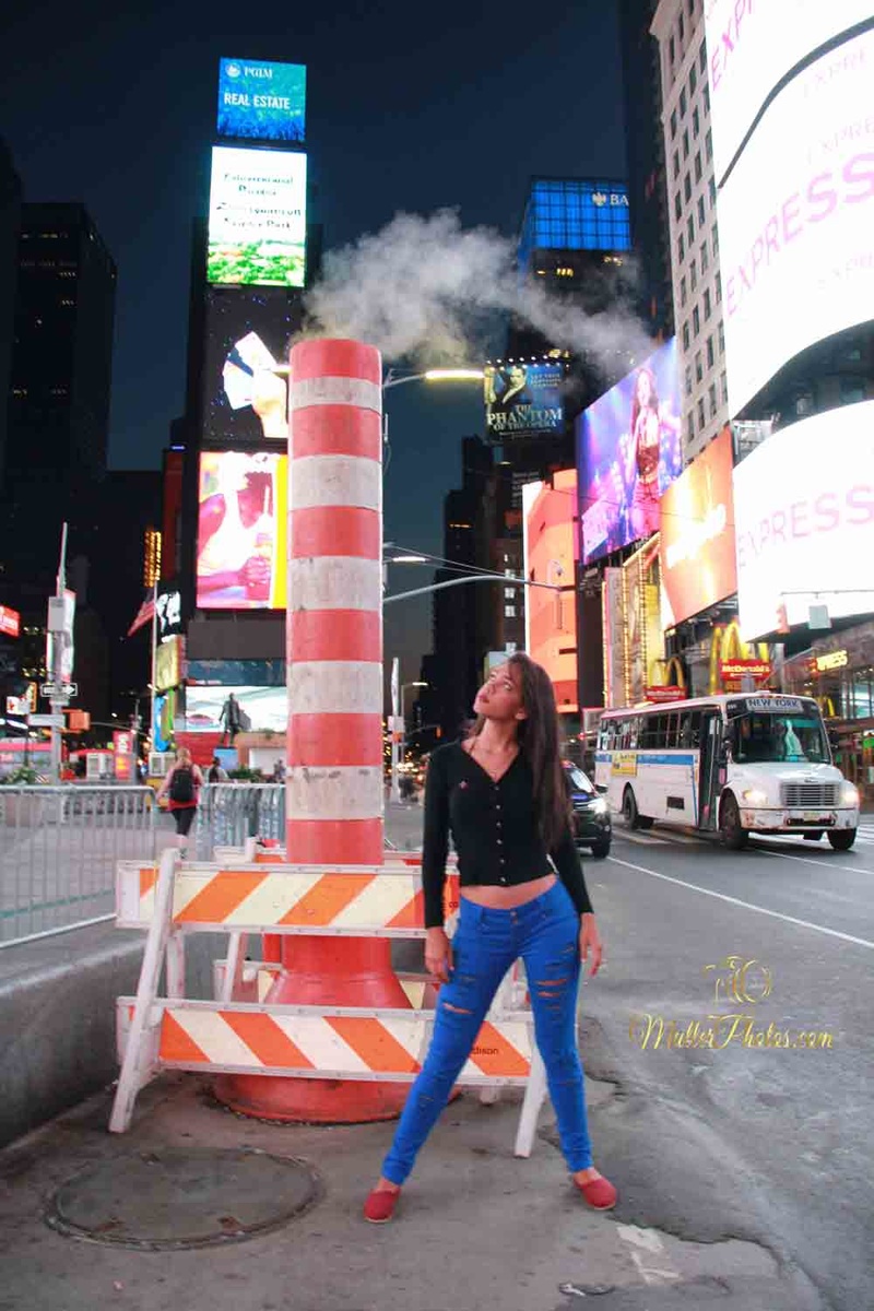 Male model photo shoot of Orlando Florida Photos in Times Square