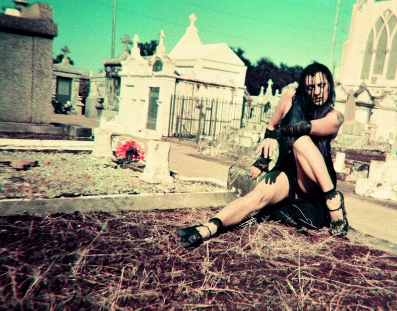 Female model photo shoot of Ooops the Clown and Bette Machete in New Orleans/ St. Roch Cementary