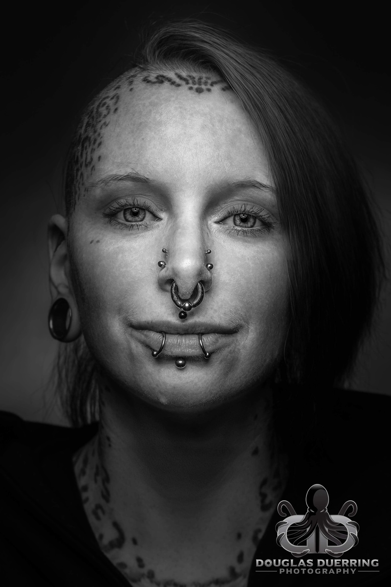 Female model photo shoot of Pierced pussykat by Douglas Duerring Photo
