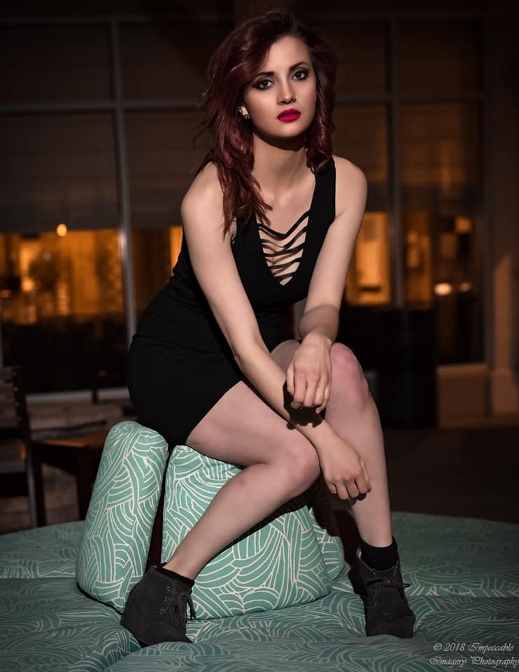 Female model photo shoot of TheMysteriousAryaPaige in Hilton Garden Inn