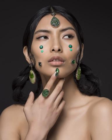 Female model photo shoot of Tee Makeup Artist