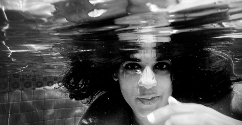 Female model photo shoot of zahrapixie in under the water