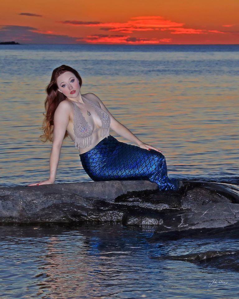 Female model photo shoot of Aurora Borealis Burlyq in Lake Superior