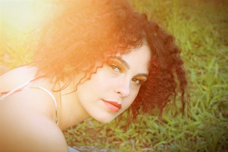 Female model photo shoot of Sidney Vargas in Crotona Park, Bronx, NY