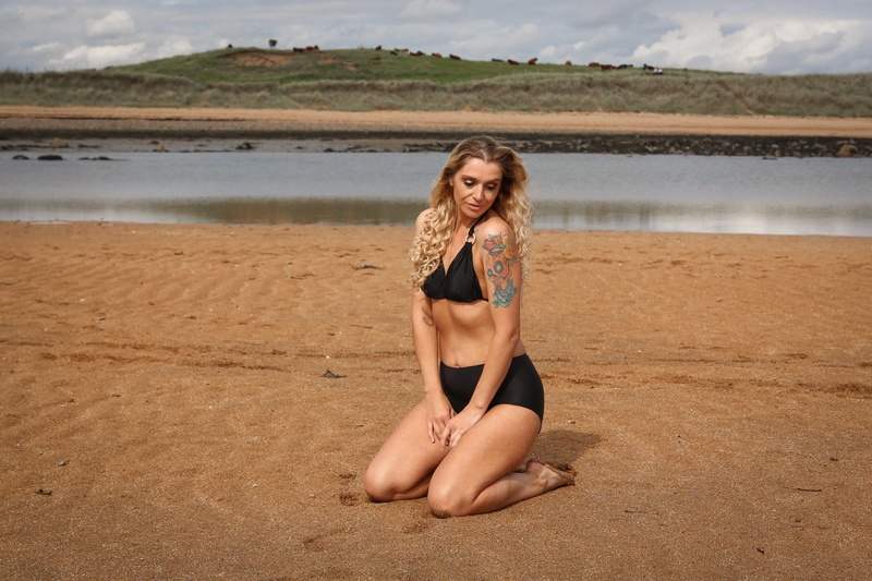 Female model photo shoot of Enigma77 in Ellie Beach