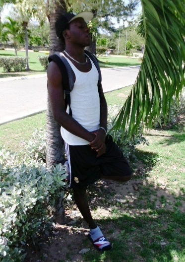 Male model photo shoot of Jahviw in National Hero's Park, Kingston Jamaica