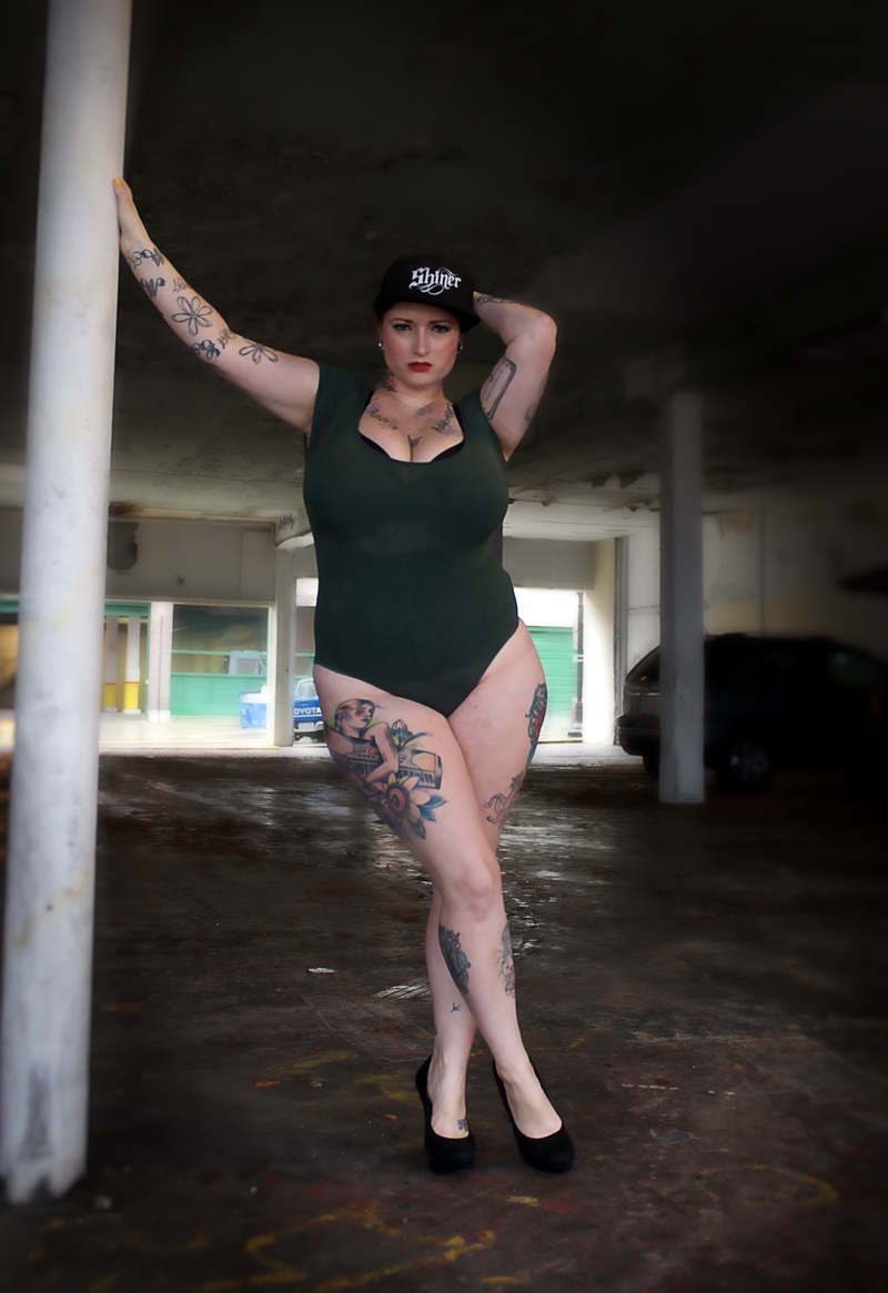 Female model photo shoot of Katie Mae by James A Hunter in Tacoma Graffiti Garages