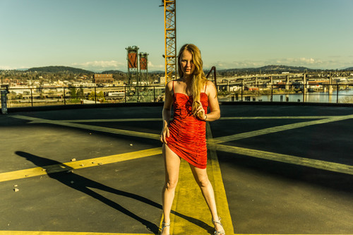 Female model photo shoot of Aphrodite Travel Model in Portland, Oregon, Helicopter Landing